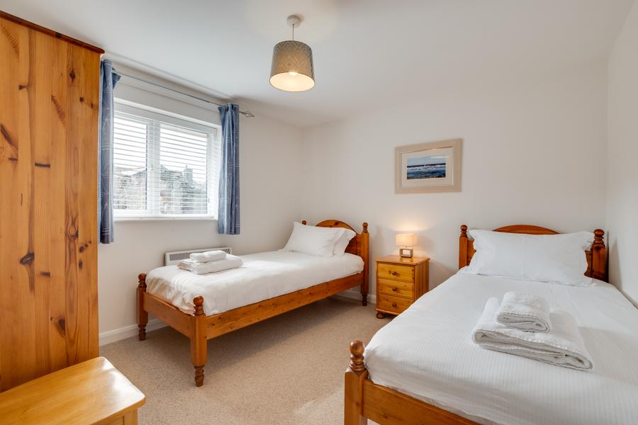Twin bedroom with two single beds