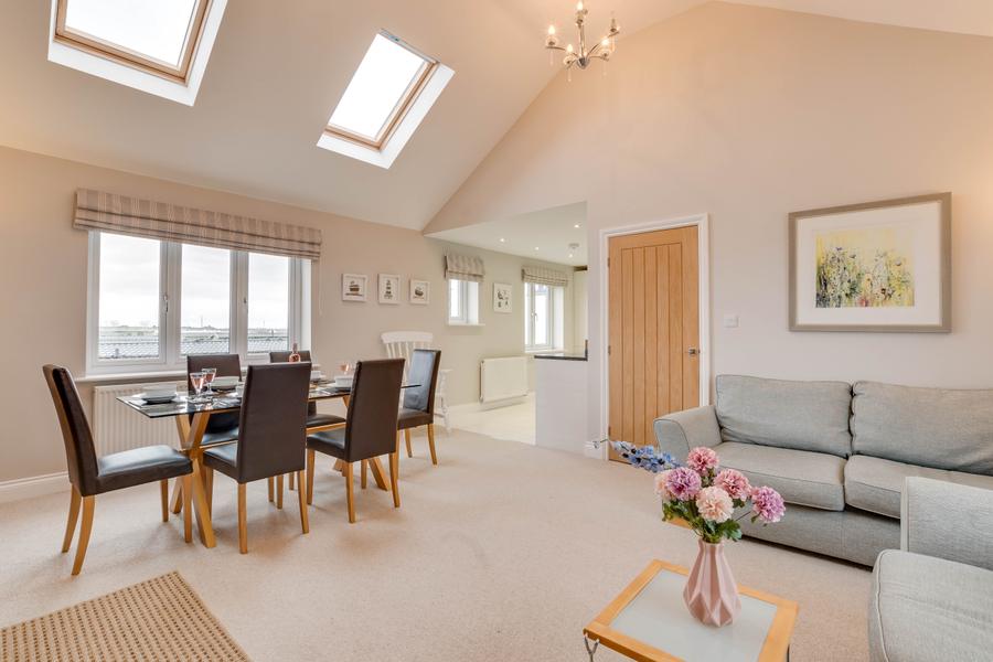 Dining table and seating area in the open plan living space
